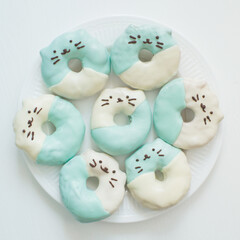 Donuts in the form of seals on a white background