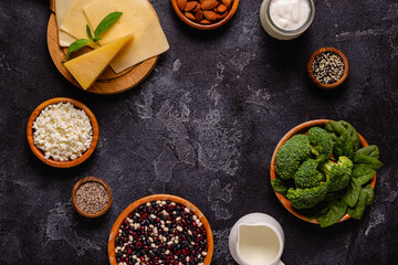 Products rich in calcium on dark background.