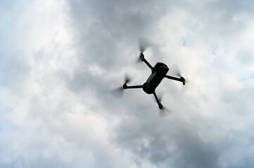 Drone flying over sky background