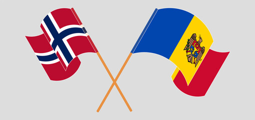 Crossed and waving flags of Norway and Moldova