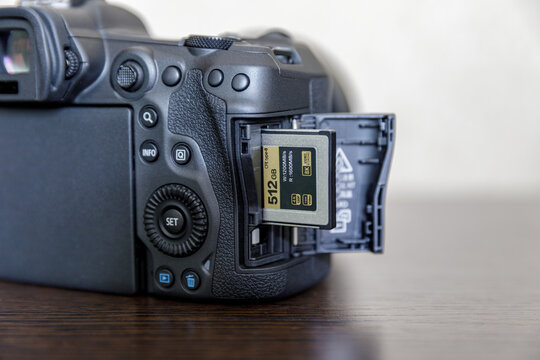 Camera with open CFexpress card slot