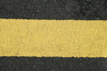 old yellow line background on the road