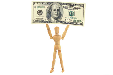 One hundred us dollars banknotes and wooden man