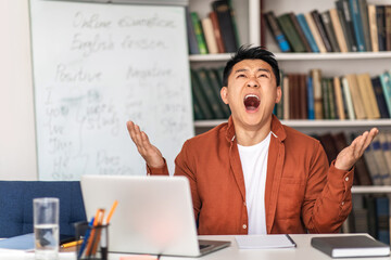 Japanese Teacher Man Shouting Having Professional Burnout Sitting In Classroom