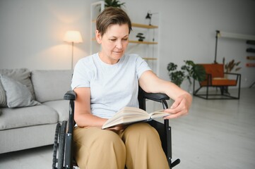 Obraz na płótnie Canvas Senior woman on a wheelchair