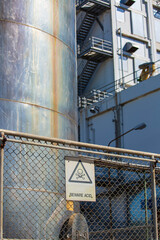Fototapeta premium Tank stainless steel industrial for chemical production symbol beware acid.