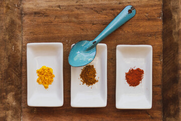 set of spices on a board