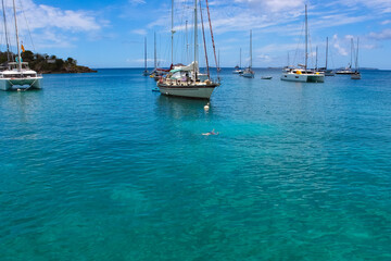 The people at snorkeling underwater and fishing tour by boat at the Caribbean Sea at St. Thomas