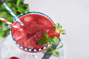 Patriotic Cocktail 4th july. Glass margarita cocktail with strawberry, mint and iced. Drinks for American Independence Day celebration.