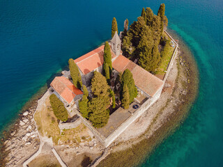 Aerophotography. View from flying drone. St George Island in the Bay of Kotor at Perast in...