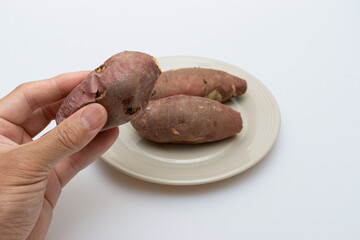 Roasted sweet potatoes on a plate that looks delicious