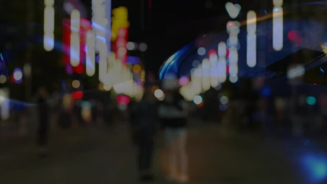 Animation of blurred road traffic over musicians playing percussion