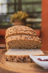 sliced brand bread on table