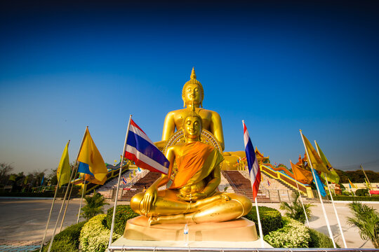 Big golden buddha statue at Wat Muang, Thailand.