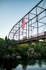 Bridge in Folsom CA with American Flag