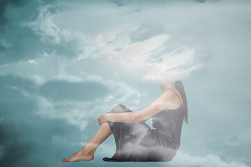 Woman head hidden by soft cloud on blue background, mental health, brain fog