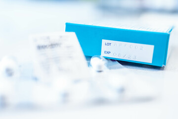 Selective focus at expiration date, lot number print on medical package from manufacturing,...