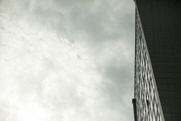 Fototapeta na wymiar Building against sky. Modern style of architecture.