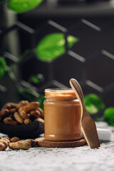 peanut paste and peanuts, the concept of healthy food