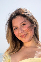 portrait of teenage girl on the seafront