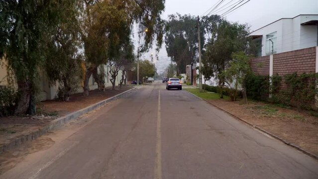 Stabilized walking shot along the streets in a residential area in El Sol de la Molina, Lima, Peru