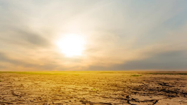  dry wide cracked saline land at the sunset, natural calamity  time lapse scene