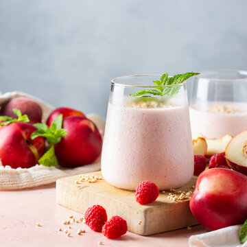 Peach raspberry smoothie, summer refreshing drink, beverage 