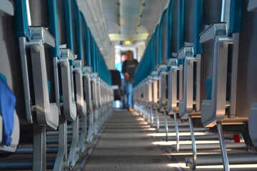 Airplane aisle during boarding