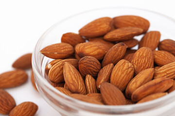 Close-up of natural big raw peeled almonds nuts as a background