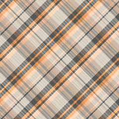 Tartan plaid pattern with texture and warm color.