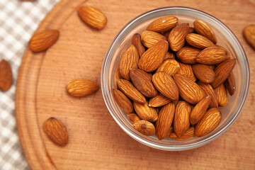 Close-up of natural big raw peeled almonds nuts as a background