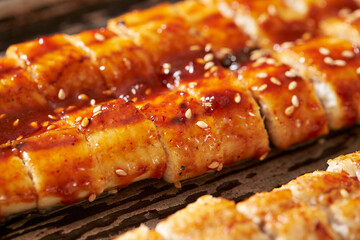 eels split and broiled[grilled] in soy, broiled eels	