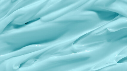 Beauty cream texture. Blue lotion, moisturizer, skin care cosmetic product smear background