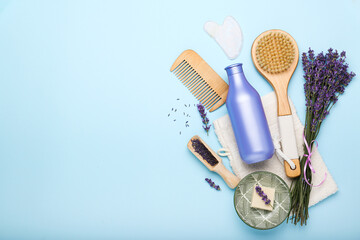 natural cosmetics on a blue background with lavender. top view