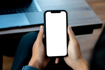 Man holding a smartphone with a simulated white screen