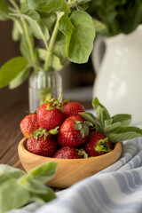 Strawberries in wood plate. Summer life. 