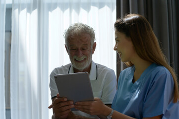 The doctor explains the results of the physical examination and health care program to elderly patients with symptoms of depression. and other complications