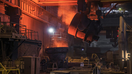 Steel casting ladle in workshop of iron foundry.