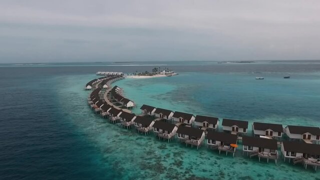 Drone shot of the water villas in the Maldives Full HD