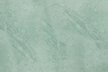 textured concrete wall. texture of coarse plaster. light green pistachio color scheme