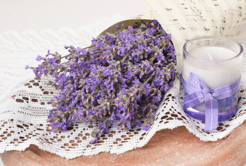  Bouquet of fresh lavender on a table with lace tablecloth