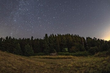 Fototapeta na wymiar Mountain landscape with starry sky and milky way