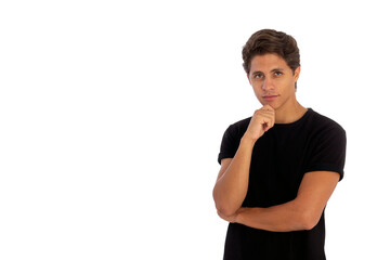 handsome young man making choice, thinking and looking pensive up, standing over white background