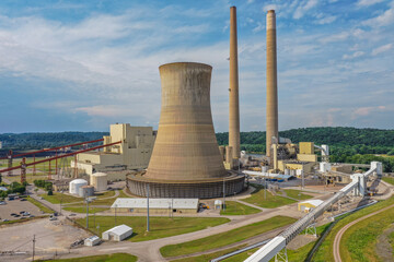 Power Plant under Blue Sky and Hazy Clouds