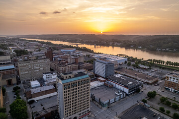 Sunset Over Small Town next to a River