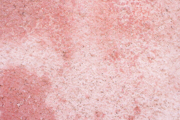 Fototapeta premium background of concrete chips in pastel pink color