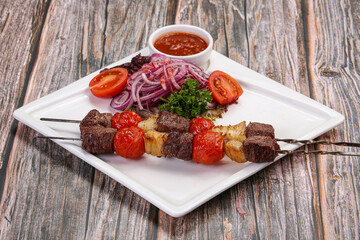 Kebab with beef and tomato