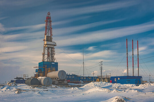 A general view of a drilling rig for drilling wells at an oil and gas field in the Arctic region. Winter. Day. Drilling equipment and technical infrastructure
