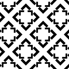 Vector. Black and white abstract ethnic seamless pattern. Background of angle brackets. Mosaic. Design of packaging paper, textile printing, web design, cover, advertising and typographic products.