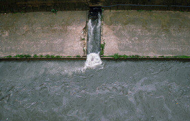 Storm water gushing into the canal after heavy rain, Kuala Lumpur, Malaysia